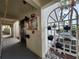 Condo hallway with elevator and decorative plants at 1751 Beach Rd # 204, Englewood, FL 34223