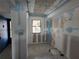 Under construction kitchen with tiled floor and drywall at 1751 Beach Rd # 204, Englewood, FL 34223