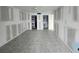 Living room with new tile and drywall at 1751 Beach Rd # 204, Englewood, FL 34223
