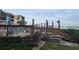 Community pool and deck with waterfront views at 1751 Beach Rd # 204, Englewood, FL 34223