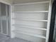 Built-in shelving unit in the living room at 1751 Beach Rd # 204, Englewood, FL 34223
