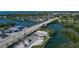 Aerial view of a coastal town with waterways, bridge, and homes at 2075 Pennsylvania Ave, Englewood, FL 34224