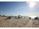 Sunny beach with people enjoying the sand and ocean at 2075 Pennsylvania Ave, Englewood, FL 34224