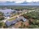 Aerial view of house with pool and large yard at 2251 Meetze St, Port Charlotte, FL 33953