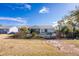 Spacious backyard with a fenced pool area at 2251 Meetze St, Port Charlotte, FL 33953