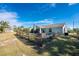 Private backyard with a pool and modern fence at 2251 Meetze St, Port Charlotte, FL 33953