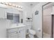 Clean bathroom with white vanity, toilet and shower at 2251 Meetze St, Port Charlotte, FL 33953