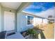 House exterior showcasing front door and landscaping at 2251 Meetze St, Port Charlotte, FL 33953