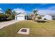 Single-Gathering home with driveway and landscaping at 2251 Meetze St, Port Charlotte, FL 33953