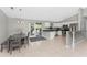 Open kitchen with stainless steel appliances and breakfast bar at 2251 Meetze St, Port Charlotte, FL 33953