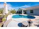 Relaxing pool area with patio furniture at 2251 Meetze St, Port Charlotte, FL 33953