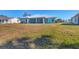 Charming home with a large backyard and screened porch at 2271 Paraiso Ct, Englewood, FL 34224