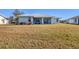 Charming home with a large backyard and screened porch at 2271 Paraiso Ct, Englewood, FL 34224