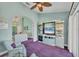 Gathering room with comfortable seating and views into living room and patio at 2271 Paraiso Ct, Englewood, FL 34224
