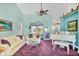Bright living room featuring a white piano and a view of the water at 2271 Paraiso Ct, Englewood, FL 34224