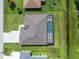 An aerial view of the house showing the pool and backyard at 35 Broadmoor Ln, Rotonda West, FL 33947