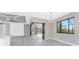 Dining area adjacent to the kitchen with sliding doors to a screened-in patio at 35 Broadmoor Ln, Rotonda West, FL 33947