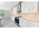 Modern kitchen with stainless steel appliances and granite countertops at 35 Broadmoor Ln, Rotonda West, FL 33947