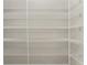 Walk-in pantry with ample shelving for storage at 35 Broadmoor Ln, Rotonda West, FL 33947