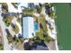 Bird's eye view of home, pool, and canal at 540 Green Dolphin S Dr, Placida, FL 33946