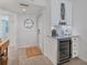 Entryway with built-in wine cooler and storage at 5856 Gasparilla Rd # M27, Boca Grande, FL 33921