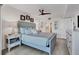 Bright bedroom with king-size bed and en-suite bathroom access at 5856 Gasparilla Rd # M27, Boca Grande, FL 33921