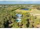 Aerial view of home with pool at 6341 Biggs St, Englewood, FL 34224