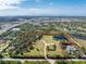 Large lot with multiple homes visible at 6341 Biggs St, Englewood, FL 34224
