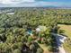 Home with pool and lush landscaping at 6341 Biggs St, Englewood, FL 34224