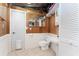 Simple bathroom with toilet, sink, and built-in storage at 6341 Biggs St, Englewood, FL 34224