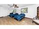 Bedroom with two twin beds and a window overlooking the garden at 6341 Biggs St, Englewood, FL 34224