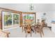 Dining area with a wooden table and access to a patio at 6341 Biggs St, Englewood, FL 34224