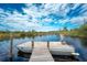 Floating dock with wooden walkway, providing access to the water at 6341 Biggs St, Englewood, FL 34224