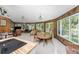 Kitchen with an island, wood countertops and modern appliances at 6341 Biggs St, Englewood, FL 34224