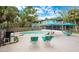 Enjoyable pool area with lounge chairs and a view of the home at 6341 Biggs St, Englewood, FL 34224
