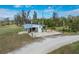 Spacious workshop with large doors and plenty of outdoor space at 6341 Biggs St, Englewood, FL 34224