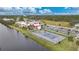 Tennis court and condo community by the water at 66 Boundary Blvd # 282, Rotonda West, FL 33947