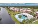 Community pool and canal side condos at 66 Boundary Blvd # 282, Rotonda West, FL 33947