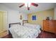 Twin bedroom with two beds and a dresser at 66 Boundary Blvd # 282, Rotonda West, FL 33947