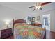 Cozy bedroom with a full-size bed and ensuite bathroom access at 66 Boundary Blvd # 282, Rotonda West, FL 33947