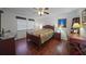 Spacious bedroom with a full-size bed and a home office area at 66 Boundary Blvd # 282, Rotonda West, FL 33947