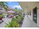 Community courtyard with seating area and landscaping at 66 Boundary Blvd # 282, Rotonda West, FL 33947