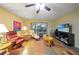 Relaxing living room featuring comfortable seating and access to a patio at 66 Boundary Blvd # 282, Rotonda West, FL 33947