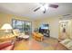 Living area featuring comfortable seating and access to a patio at 66 Boundary Blvd # 282, Rotonda West, FL 33947