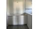 New bathroom with double sink vanity and modern tiling at 7351 Lighthouse St, Englewood, FL 34224