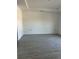 This living room boasts spacious design and sleek tile flooring at 7351 Lighthouse St, Englewood, FL 34224