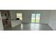 Bright living room with an open floor plan and access to the outdoors at 7351 Lighthouse St, Englewood, FL 34224