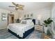 Bright bedroom with a king-size bed and coastal decor at 7482 Palm Island Dr # 2511, Placida, FL 33946