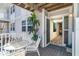 Private deck with white metal table and chairs, offering peaceful outdoor space at 7482 Palm Island Dr # 2511, Placida, FL 33946
