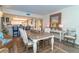 A casual dining area with a view of the kitchen and living room at 7482 Palm Island Dr # 2511, Placida, FL 33946